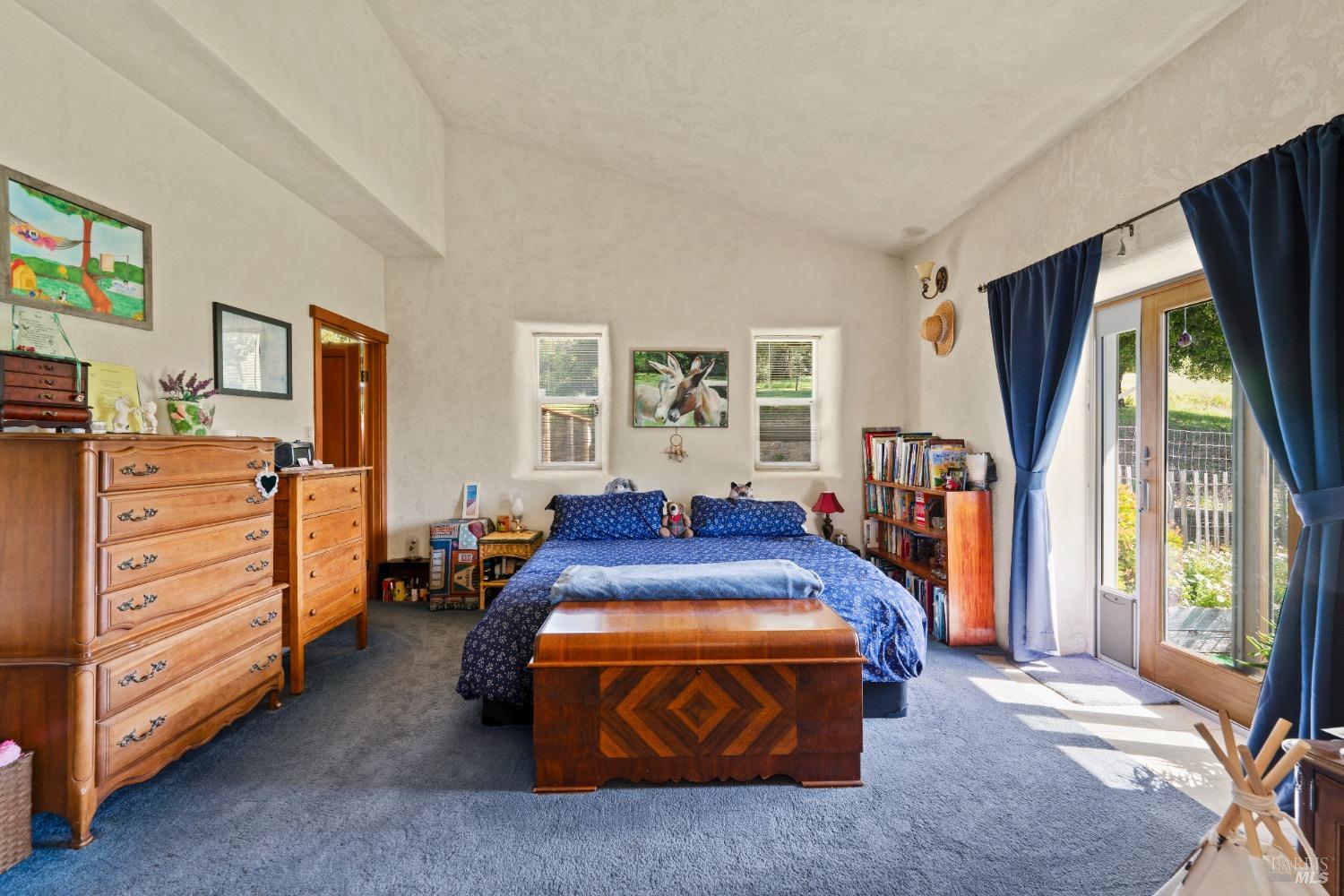 9655 Peachland Road Boonville, CA 95415 - Photo 14 of 40 a bed room with a bed and a dresser