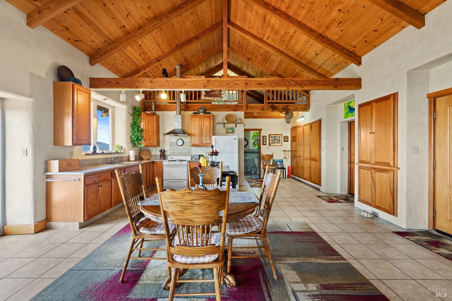 9655 Peachland Road Boonville, CA 95415 - Photo 21 of 40 a dining room with furniture and window