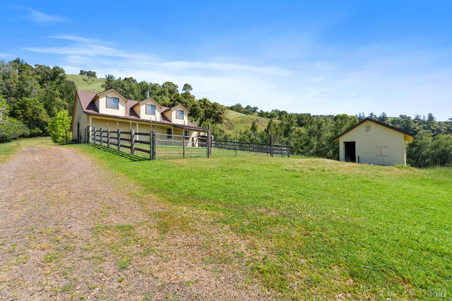 9655 Peachland Road Boonville, CA 95415 - Photo 4 of 40 a view of a house with a yard