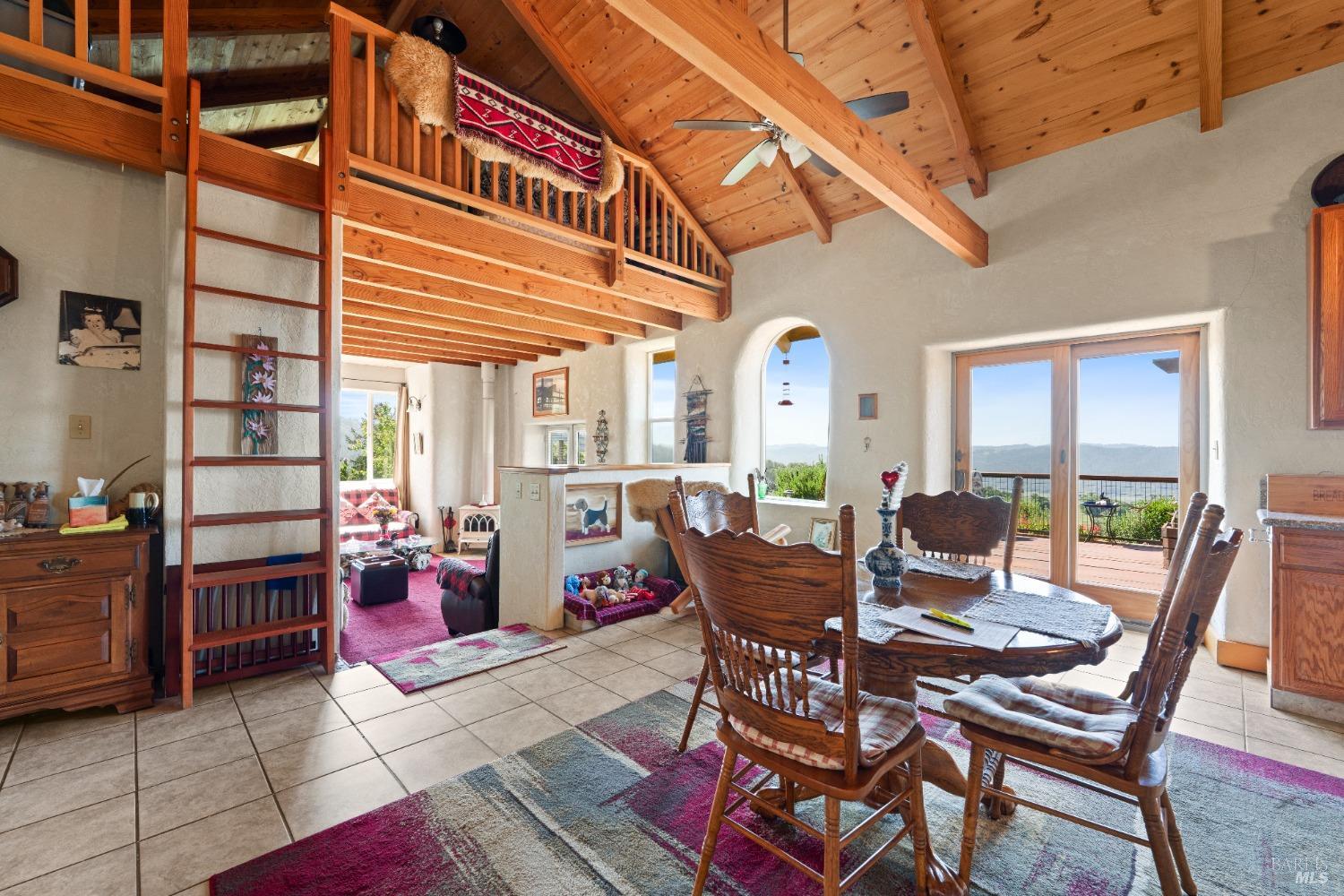 9655 Peachland Road Boonville, CA 95415 - Photo 10 of 40 a view of a dining room with furniture and window