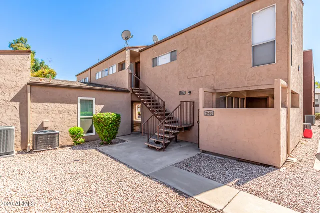 a view of a house with a patio