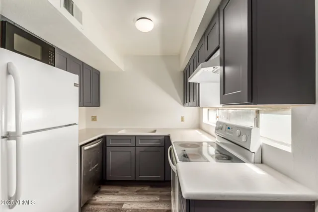 a utility room with washer and dryer