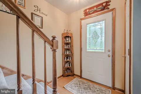 a view of front door with stairs