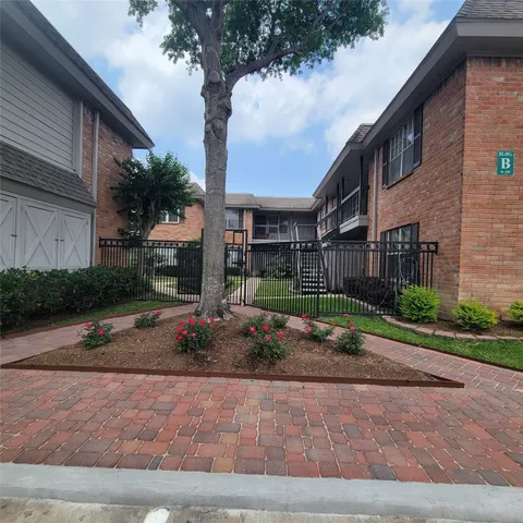a view of a flower in a yard