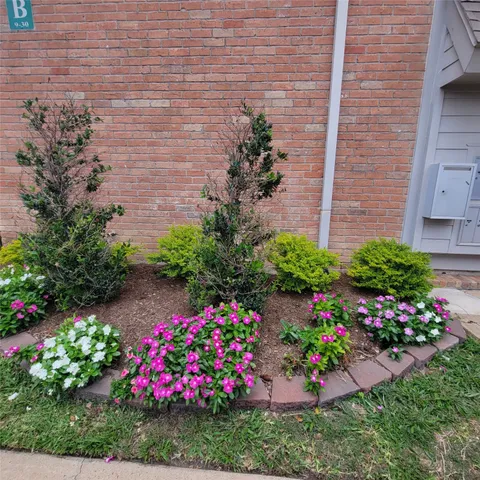 a view of a backyard with sitting area