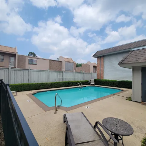 a view of street with sitting area
