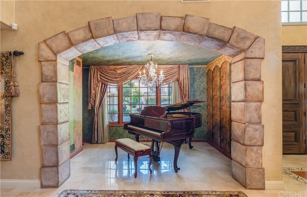 15237 Sutton Street Sherman Oaks, CA 91403 - Photo 12 of 31 a living room with a couch and a table