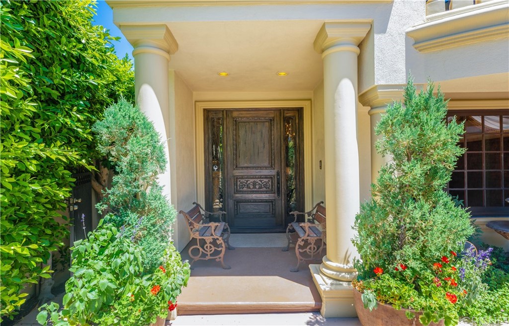 15237 Sutton Street Sherman Oaks, CA 91403 - Photo 4 of 31 a front view of a house with a yard