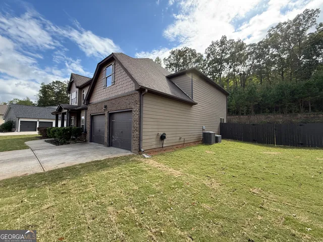 a house view with a garden space