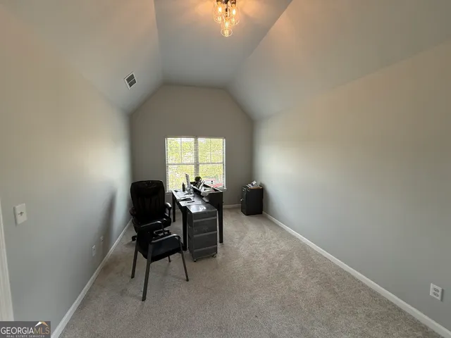 a bathroom with a sink a washer and dryer