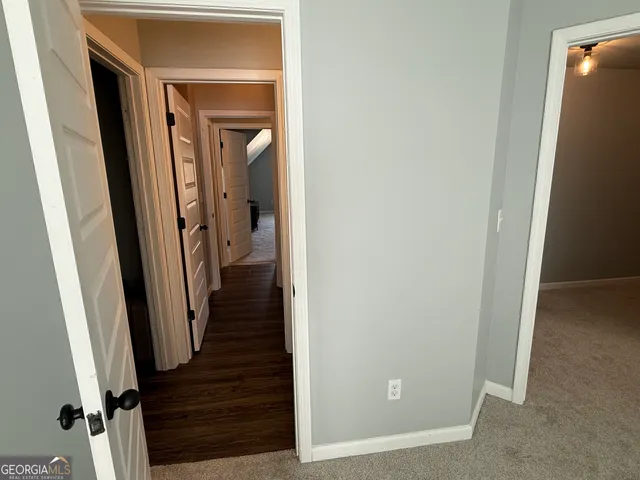 a bedroom with furniture and window