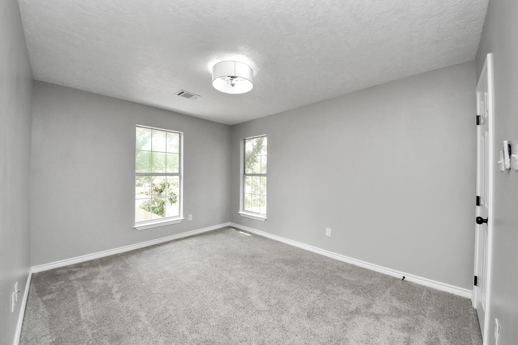 1105 East Kyle Road Clute, TX 77531 - Photo 19 of 44 The upstairs game room features two large windows gives plenty of natural light.