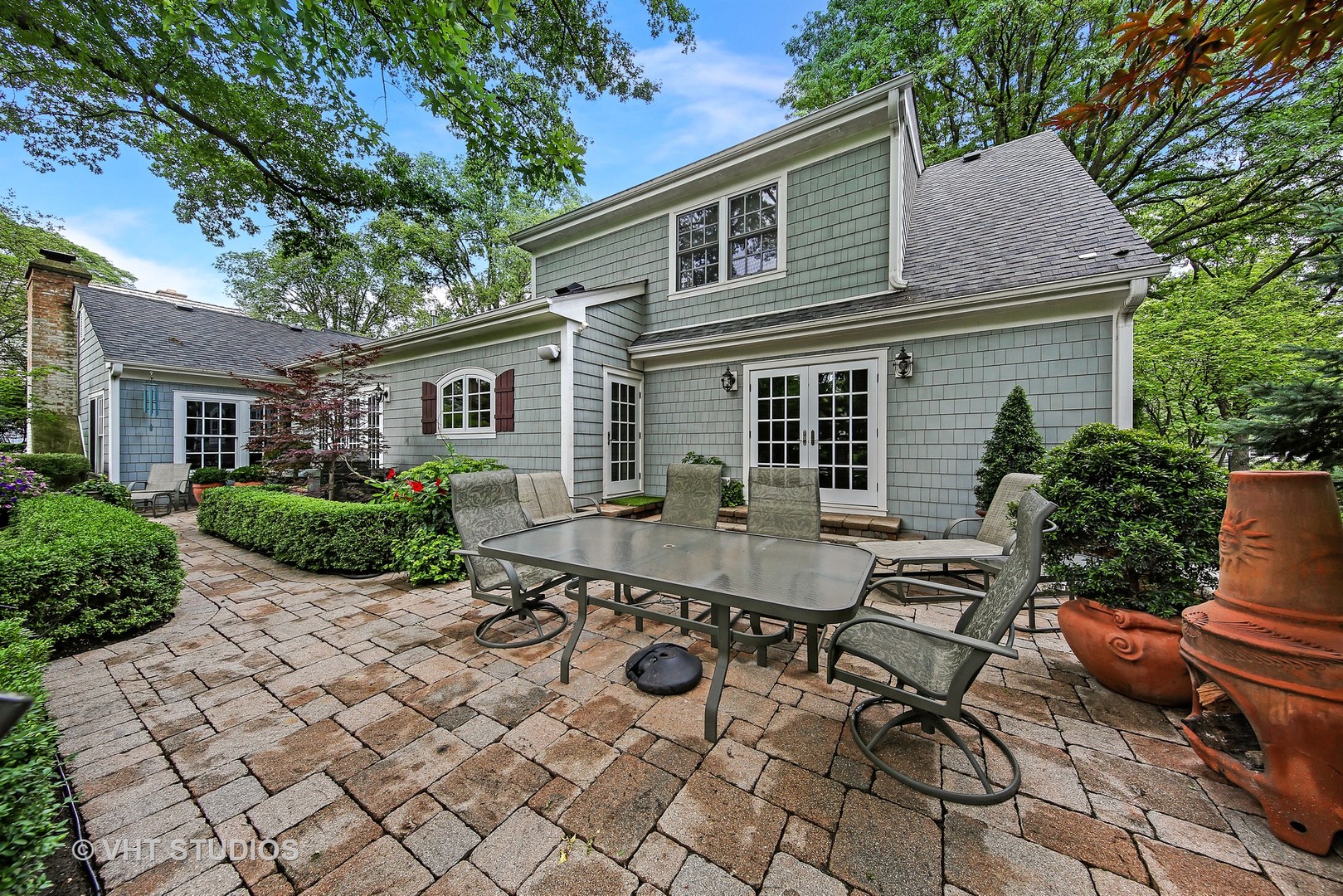 1140 Woodview Road Burr Ridge, IL 60527 - Photo 3 of 35 a view of backyard with outdoor seating and plants