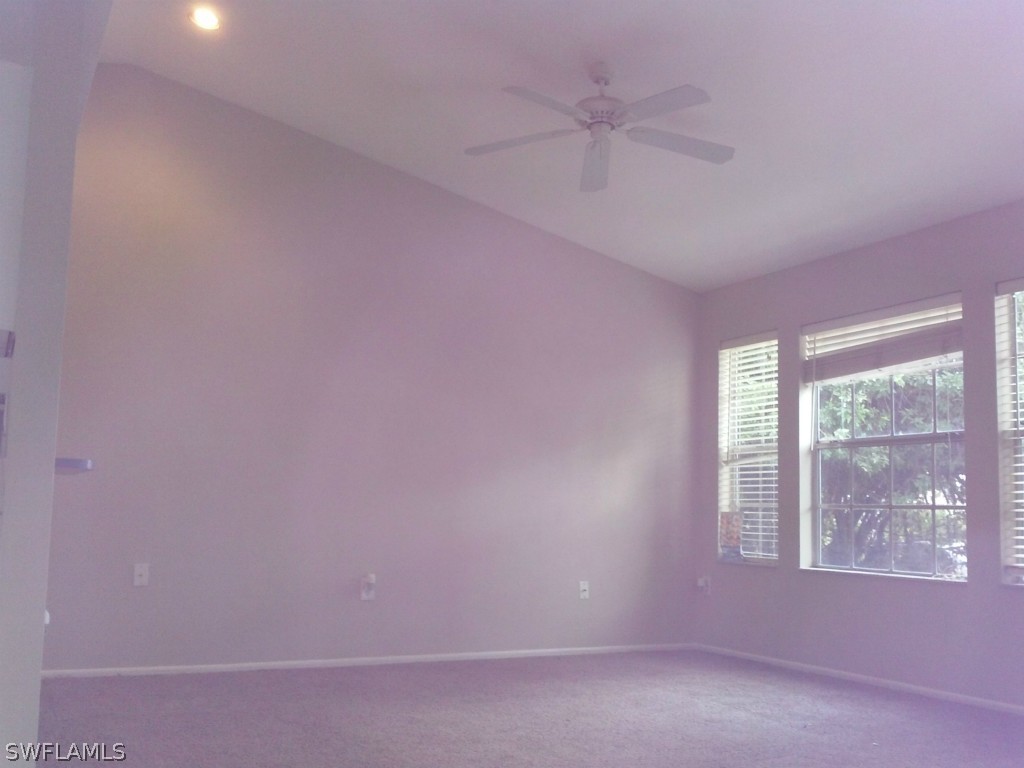 9099 Henry Road Fort Myers, FL 33967 - Photo 3 of 10 an empty room with a window