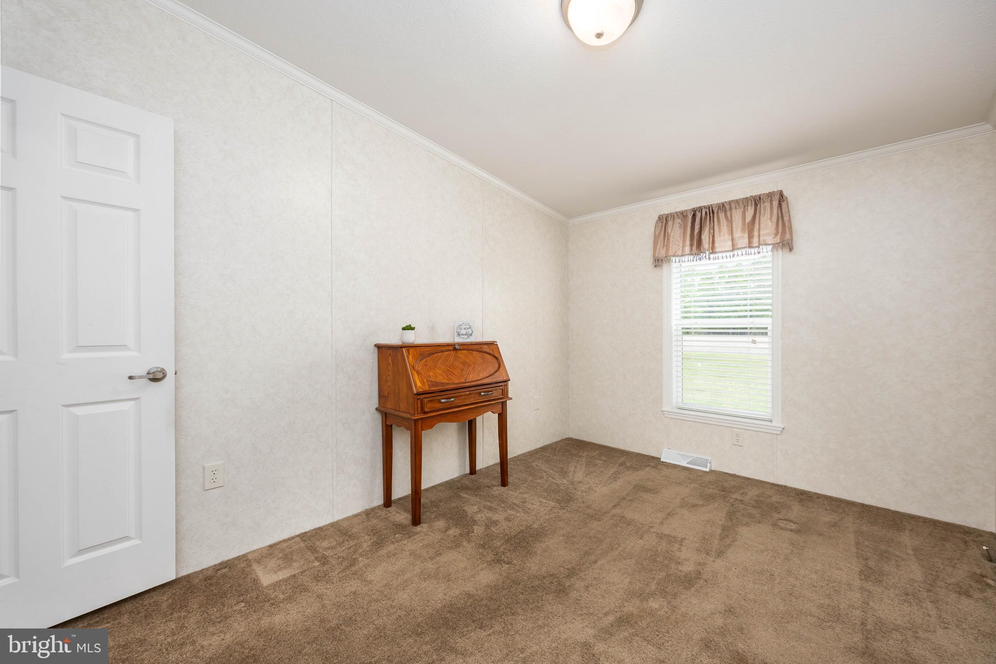4258 Smith Road Salisbury, MD 21801 - Photo 36 of 43 a view of an empty room with a window