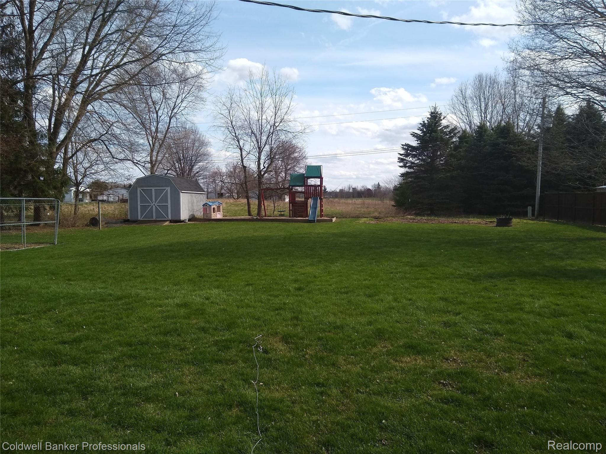 1926 North Branch Road North Branch, MI 48461 - Photo 3 of 27 Back yard with field.jpg