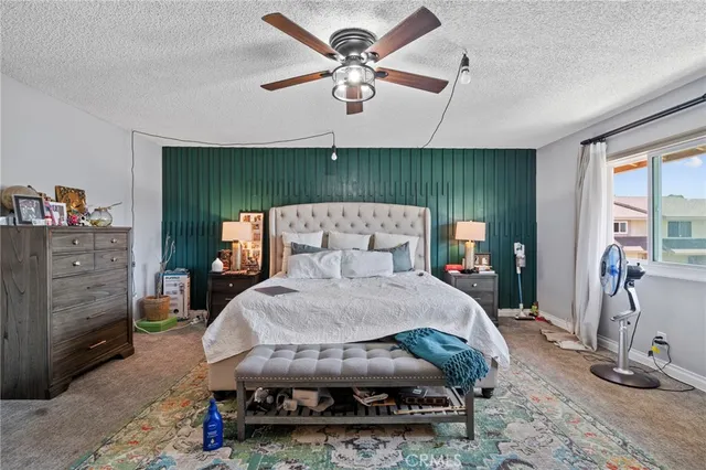 a bed room with a bed and a couch