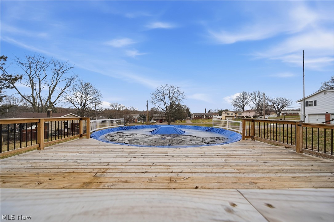 702 Perry Drive Northwest Canton, OH 44708 - Photo 31 of 46 Wooden deck featuring a residential view