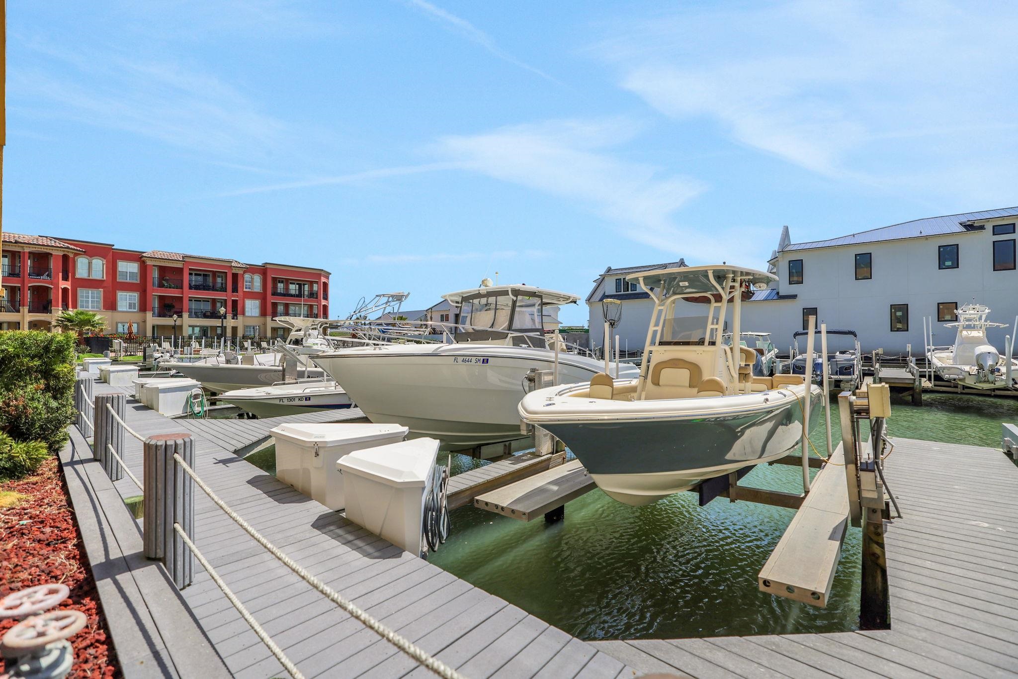 120 Sunset Harbor Way, Unit 202 St. Augustine, FL 32080 - Photo 37 of 50 a view of a swimming pool with outdoor seating