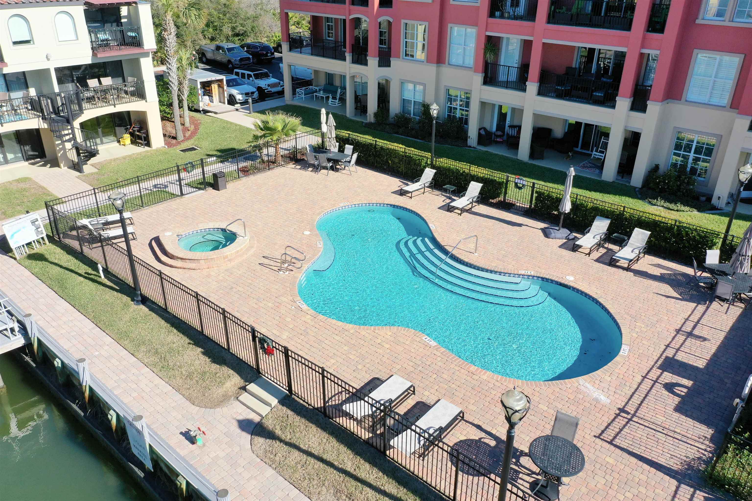 120 Sunset Harbor Way, Unit 202 St. Augustine, FL 32080 - Photo 40 of 50 a view of swimming pool with outdoor seating and yard