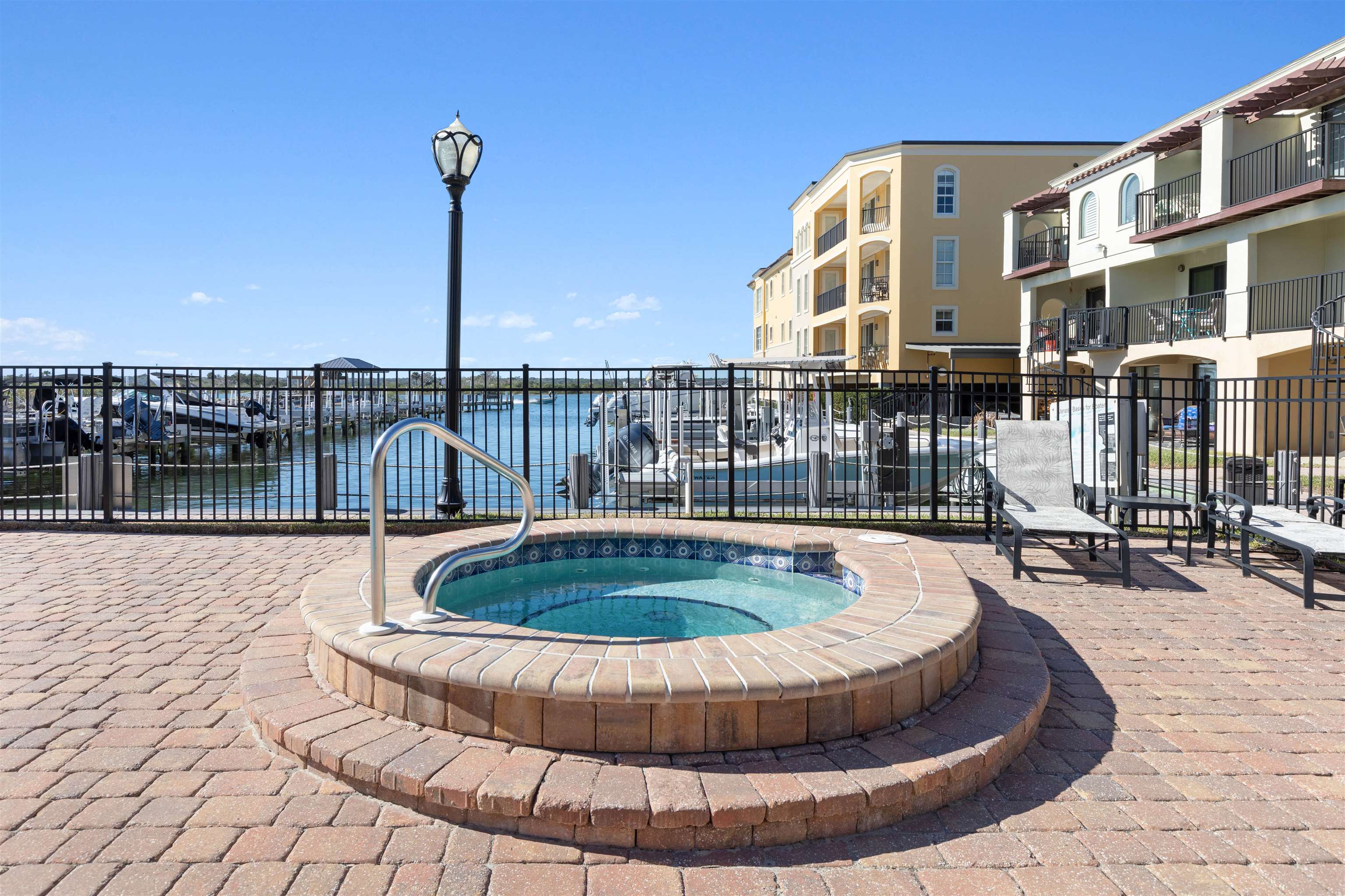 120 Sunset Harbor Way, Unit 202 St. Augustine, FL 32080 - Photo 42 of 50 a view of a swimming pool with a fountain