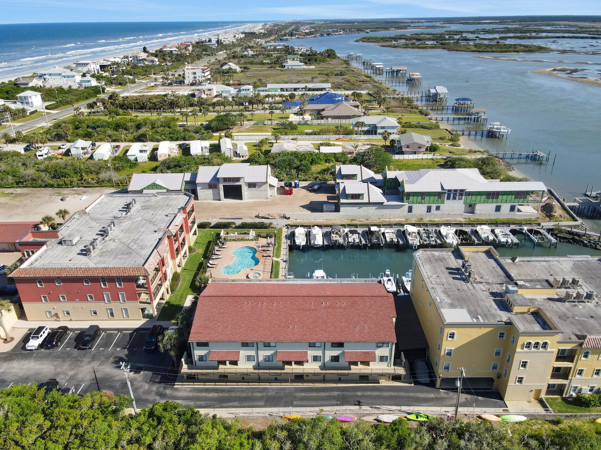 120 Sunset Harbor Way, Unit 202 St. Augustine, FL 32080 - Photo 44 of 50 an aerial view of a building with outdoor space