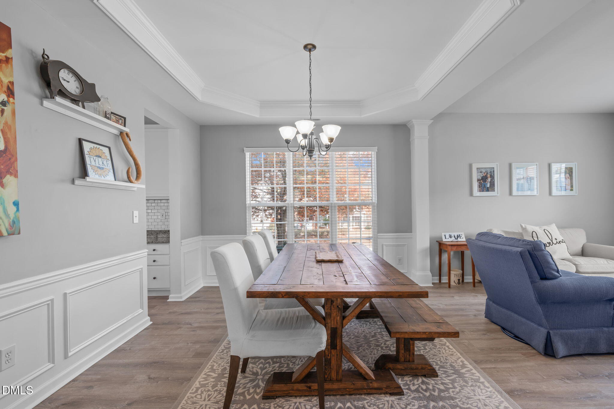 7461 Lagrange Drive Raleigh, NC 27613 - Photo 10 of 54 a view of a dining room with furniture window and wooden floor