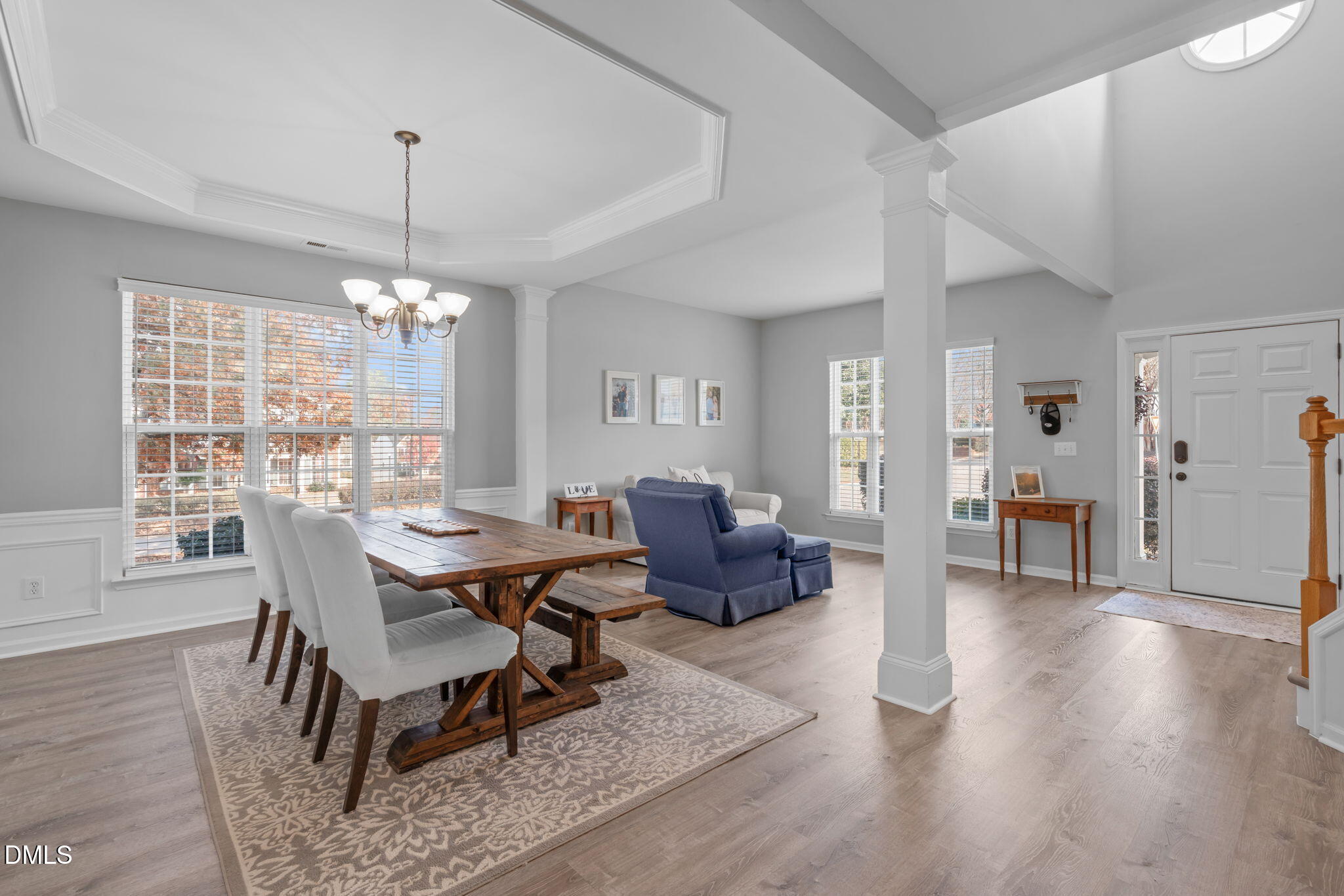 7461 Lagrange Drive Raleigh, NC 27613 - Photo 11 of 54 a view of a dining room with furniture window and wooden floor