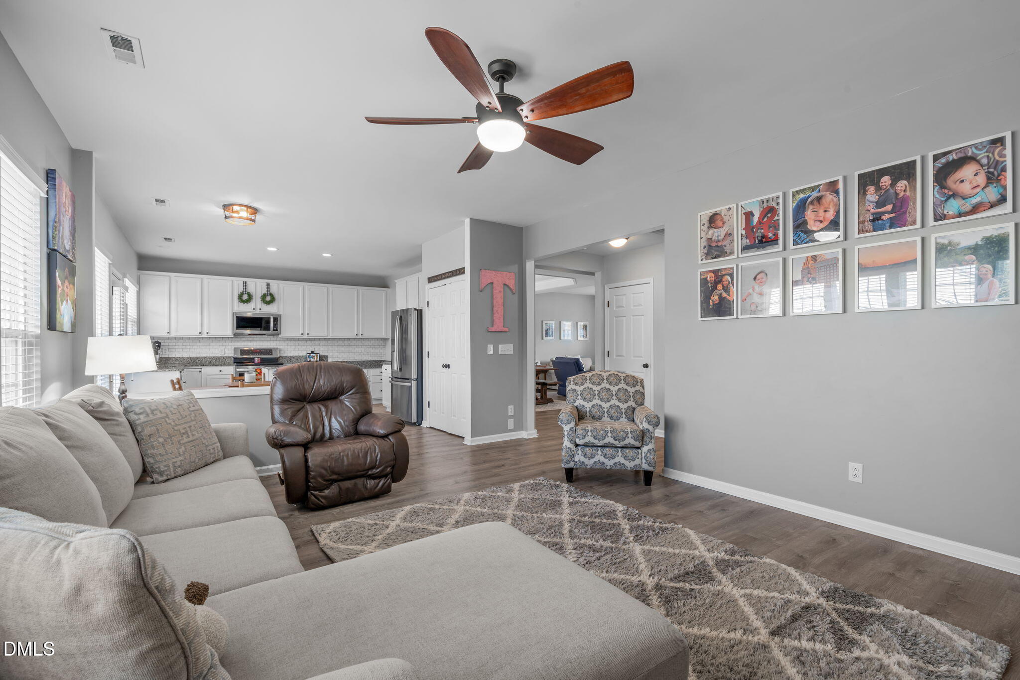 7461 Lagrange Drive Raleigh, NC 27613 - Photo 15 of 54 a living room with furniture and kitchen view