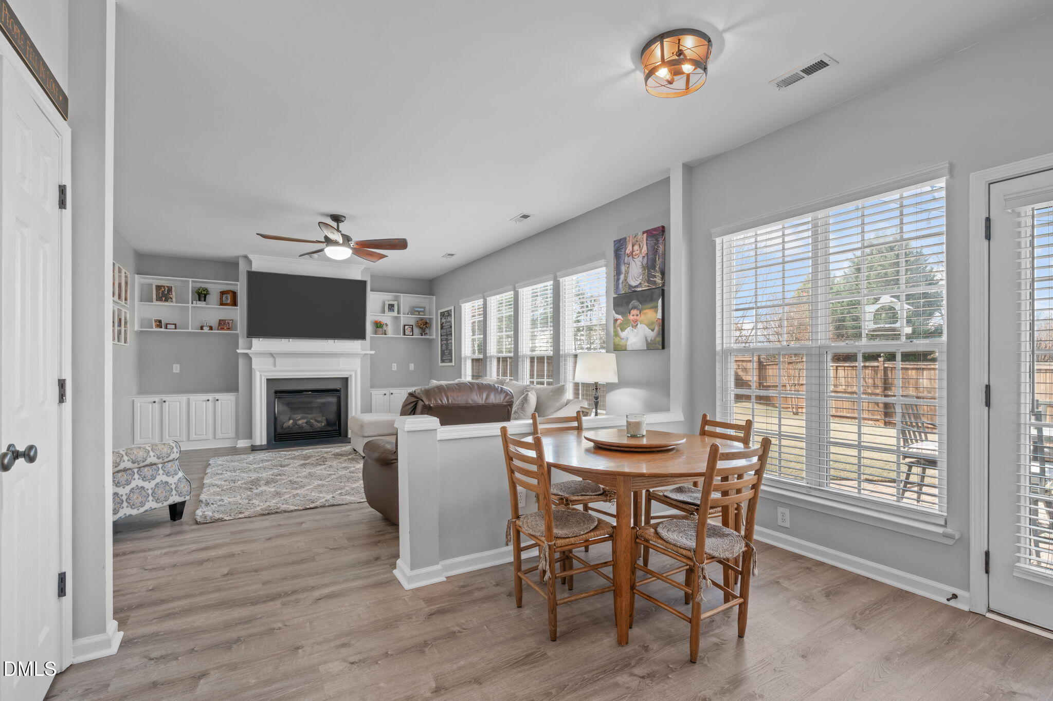 7461 Lagrange Drive Raleigh, NC 27613 - Photo 18 of 54 a view of a dining room with furniture window and wooden floor