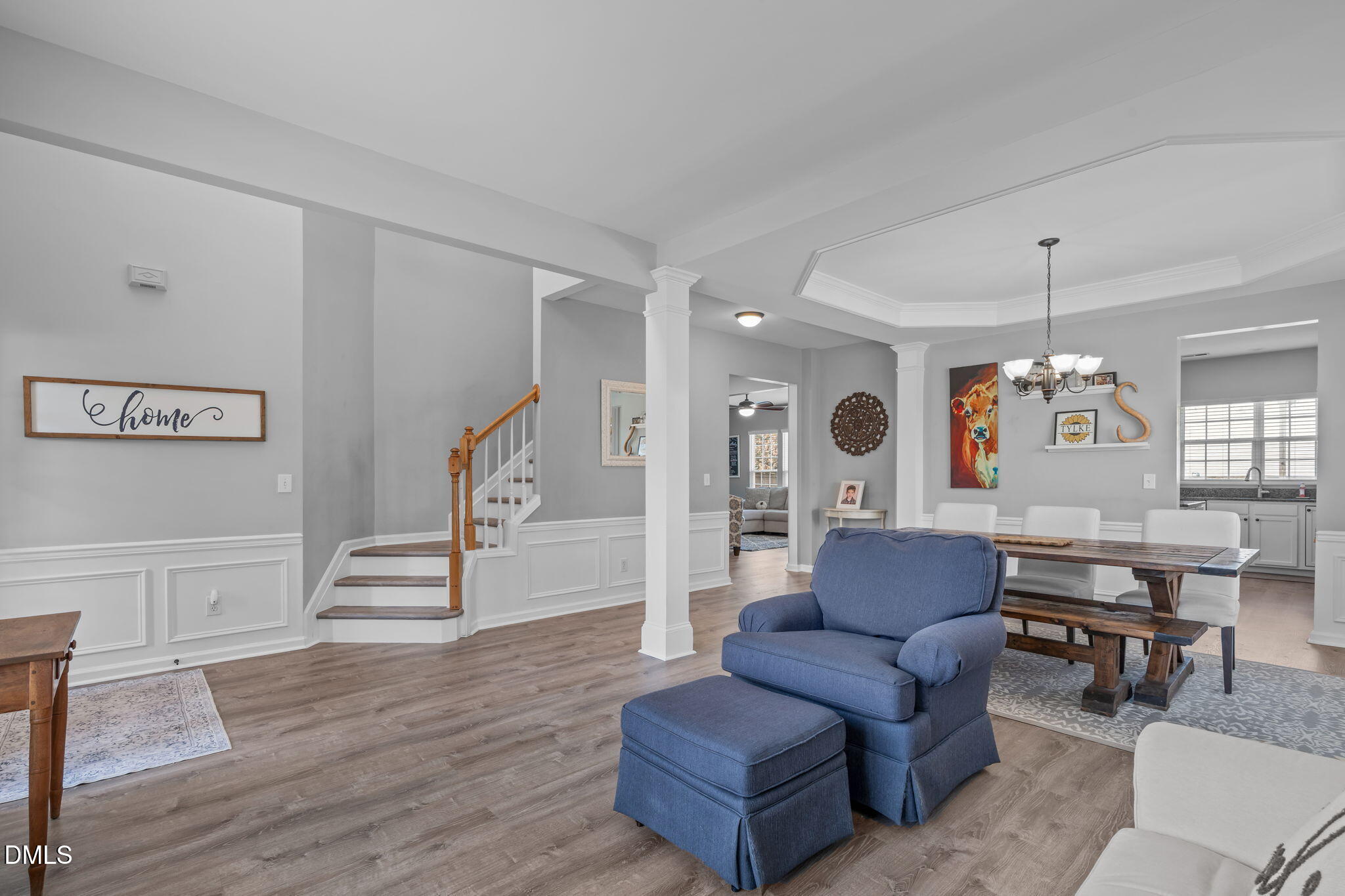 7461 Lagrange Drive Raleigh, NC 27613 - Photo 7 of 54 a living room with furniture and a wooden floor