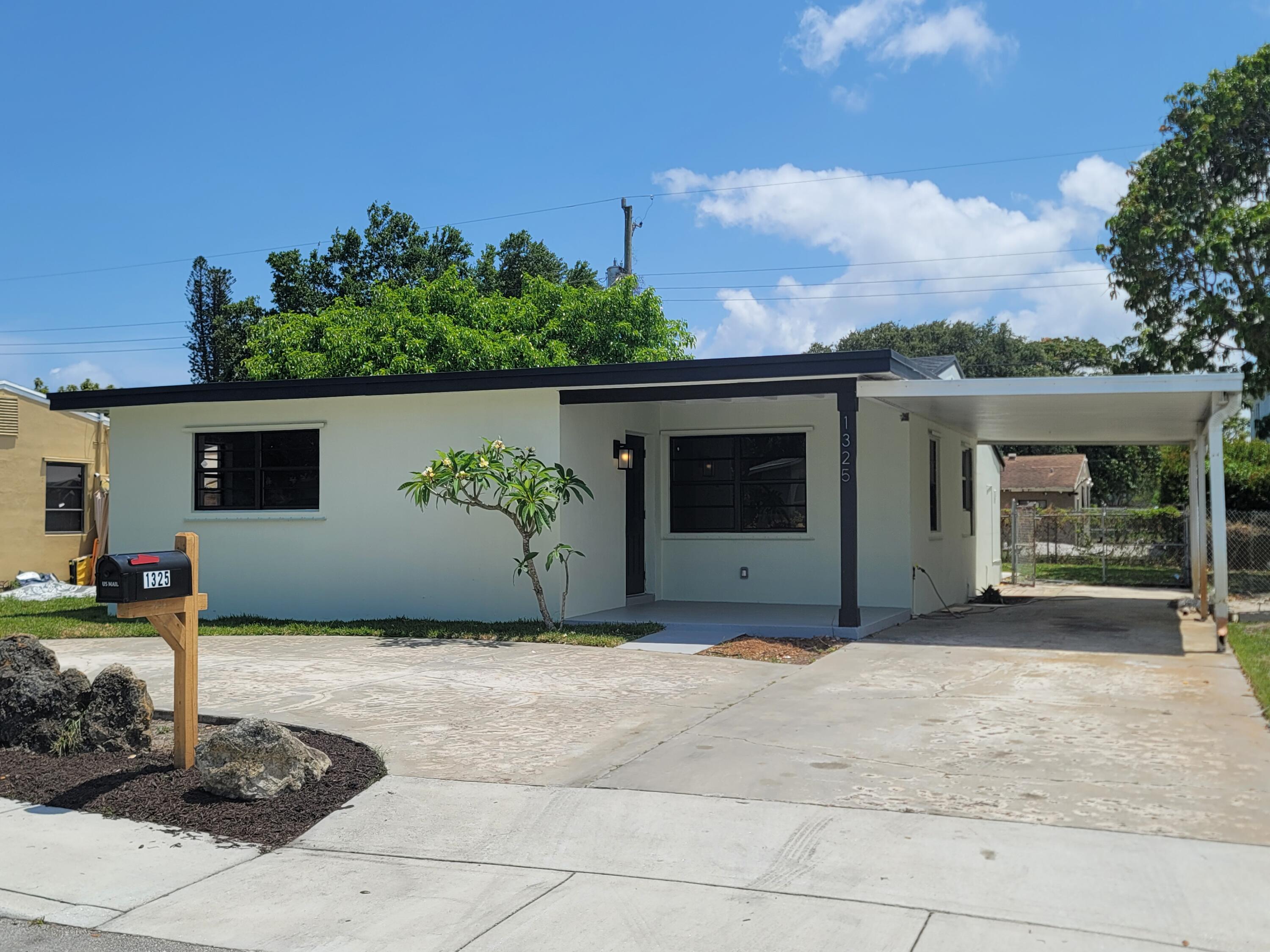 1325 West 24th Street Riviera Beach, FL 33404 - Photo 1 of 5 Front