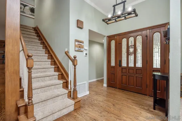 a living room with furniture window and a flat screen tv