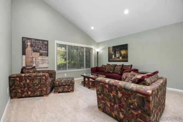 a living room with furniture and a couch