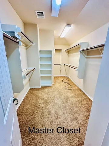 a bathroom with a tub a sink and a shower
