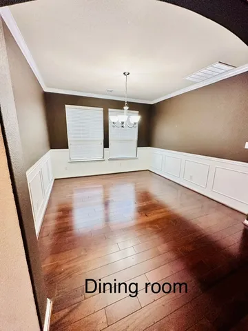 a view of kitchen with furniture and window