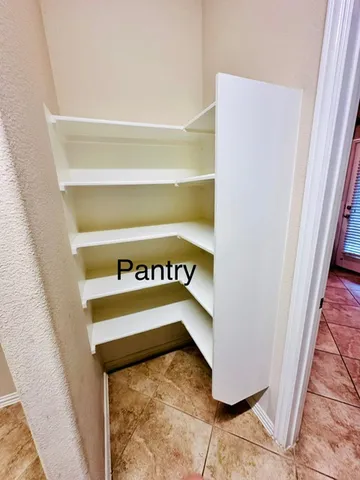 a close up of a street with a door