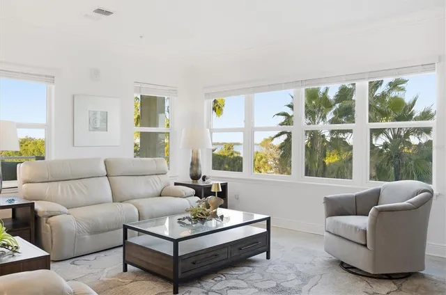 a bathroom with a sink vanity mirror and toilet
