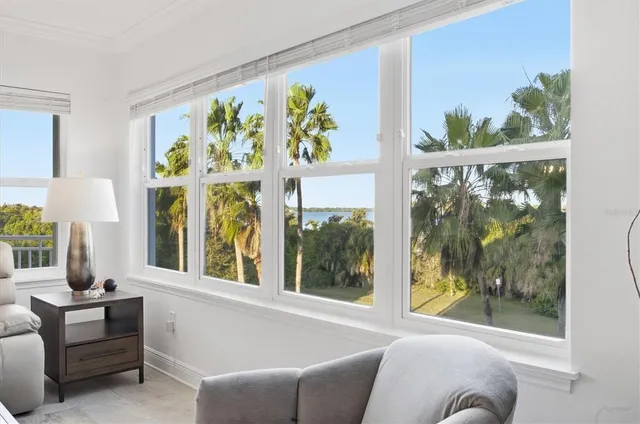 a bathroom with a sink mirror and vanity