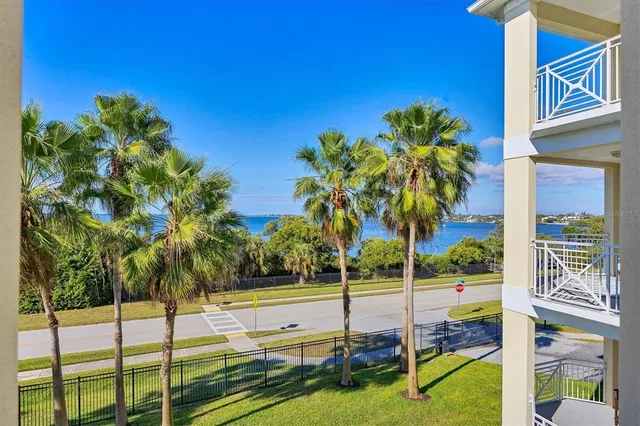 a kitchen with sink and refrigerator