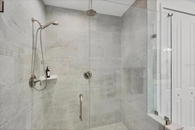 a room with gym equipment and large mirror