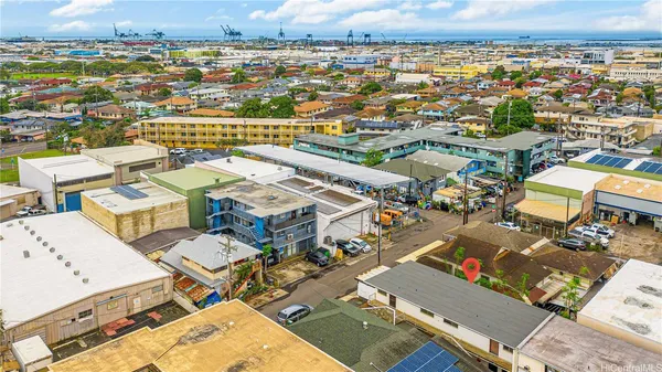 an aerial view of a city with lots of residential buildings