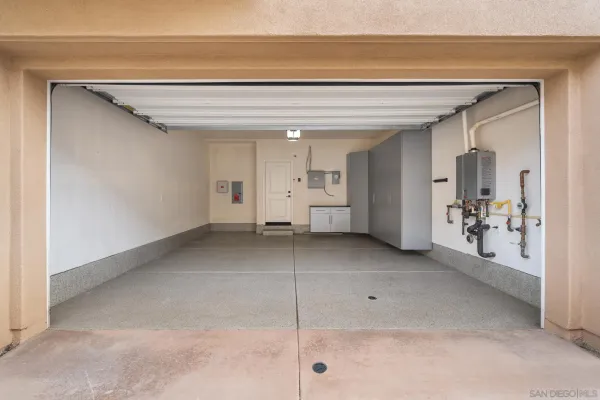a view of a livingroom with furniture and closet