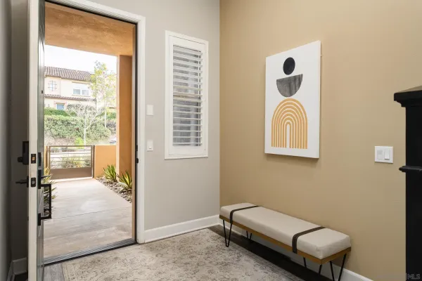 a room with a couch and a window