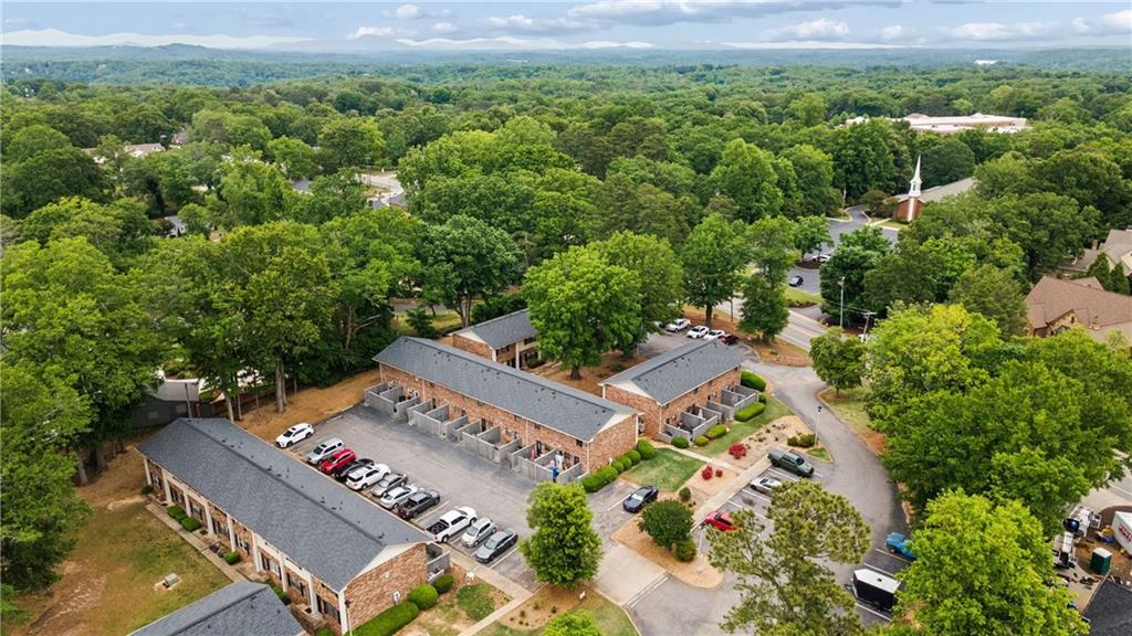 1235 Riverside Drive, Unit C8 Gainesville, GA 30501 - Photo 22 of 24 an aerial view of a city with lots of residential buildings