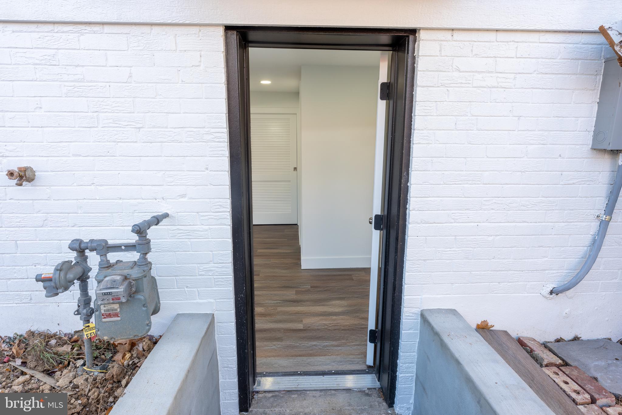 13208 Holdridge Road Silver Spring, MD 20906 - Photo 22 of 29 a bathroom with a granite countertop sink and a mirror