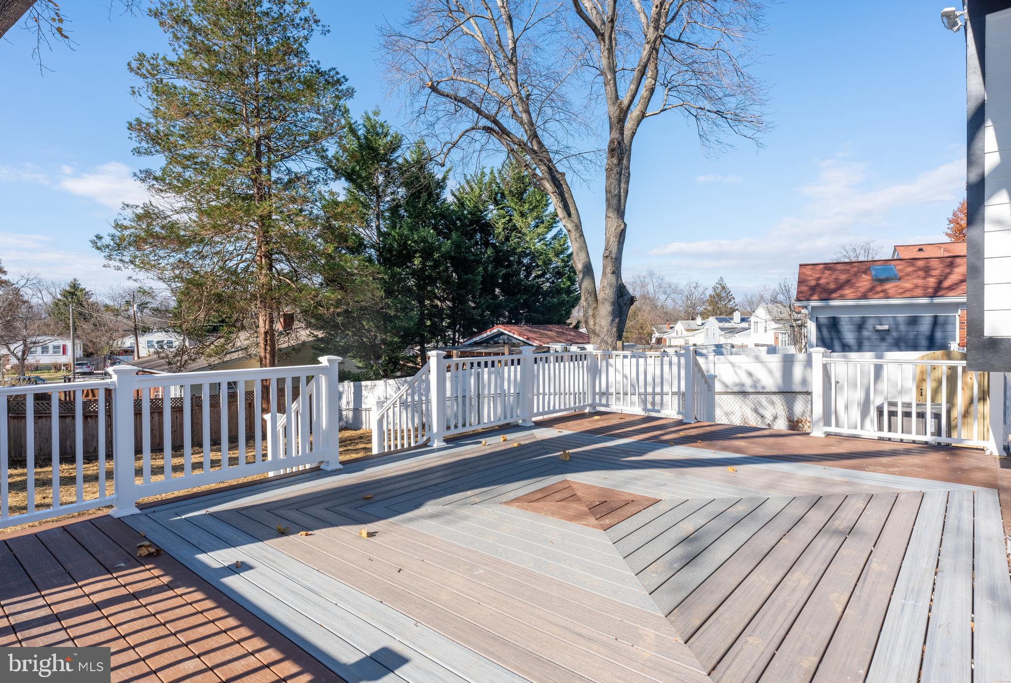 13208 Holdridge Road Silver Spring, MD 20906 - Photo 23 of 29 a view of a balcony with wooden floor and fence