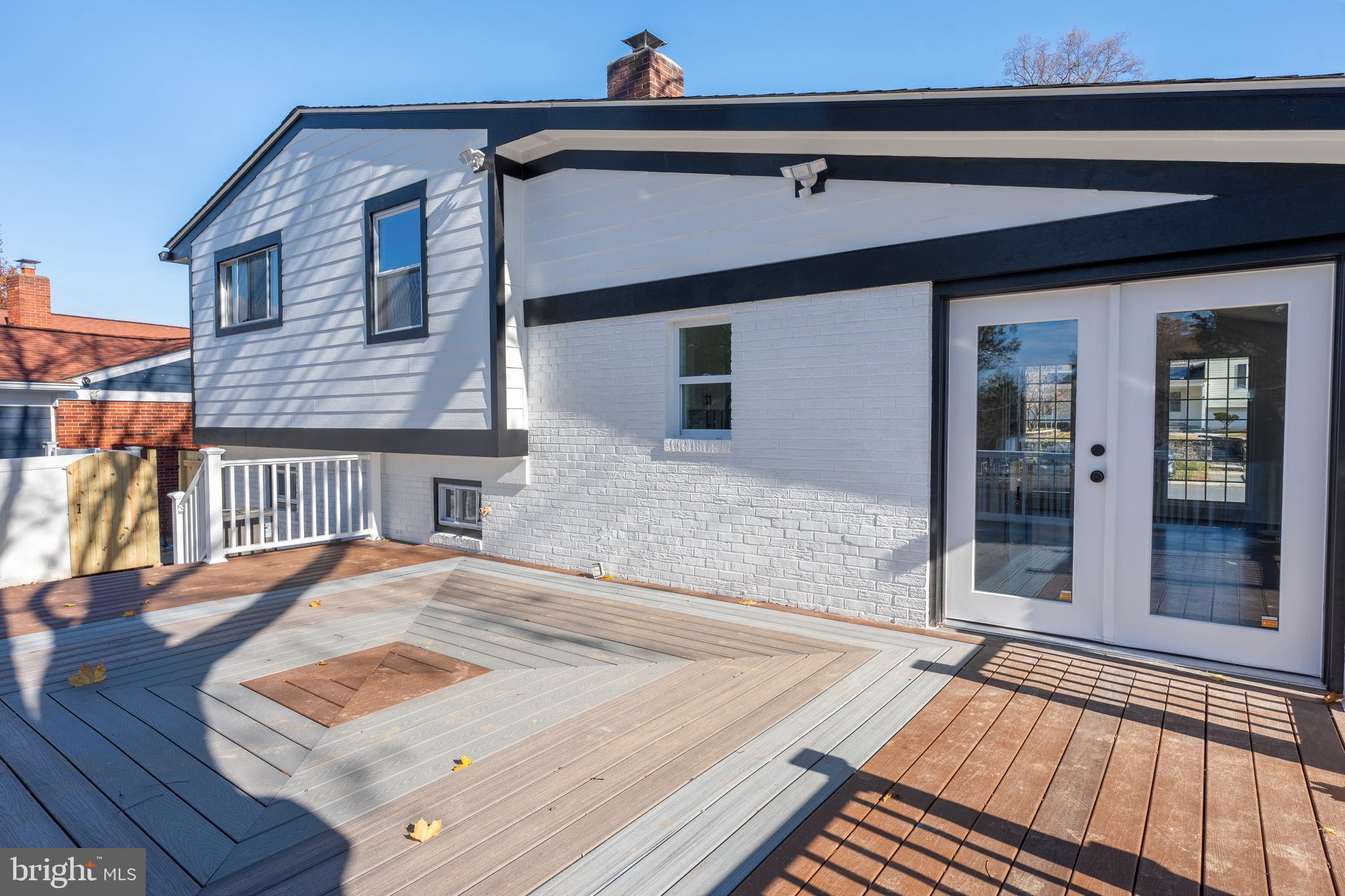 13208 Holdridge Road Silver Spring, MD 20906 - Photo 24 of 29 a backyard of a house with seating space