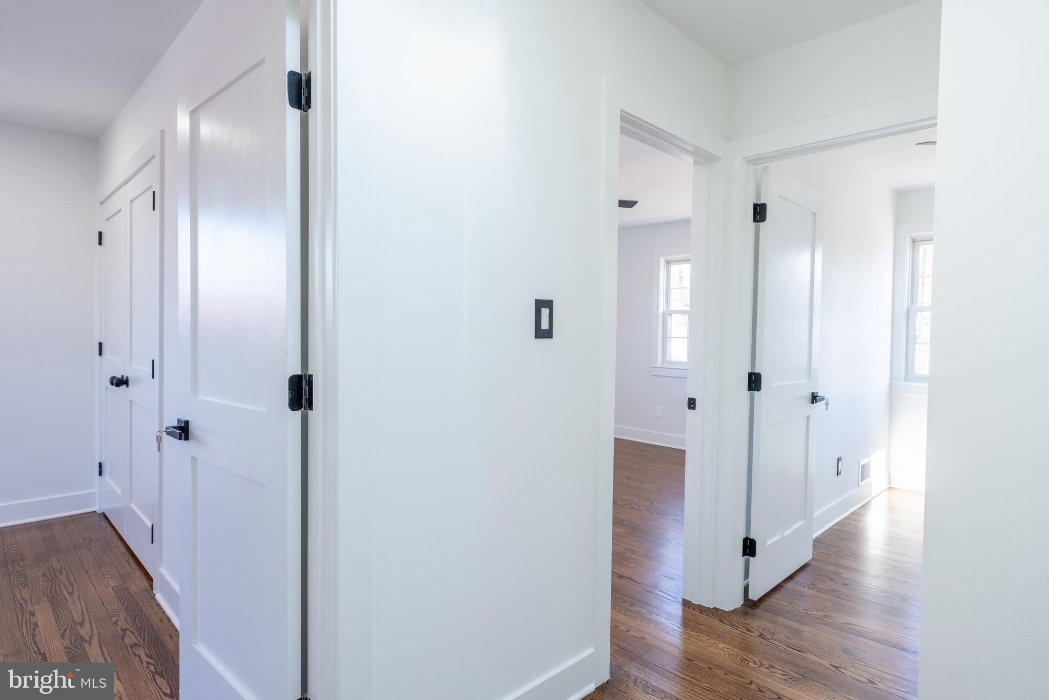 13208 Holdridge Road Silver Spring, MD 20906 - Photo 10 of 29 a view of a hallway with wooden floor