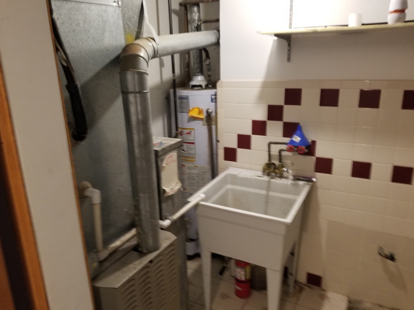 547 North Ridgemoor Avenue Mundelein, IL 60060 - Photo 16 of 19 a bathroom with a sink a toilet and a mirror